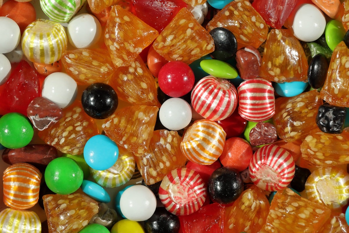 A colorful assortment of hard candies and chocolates.