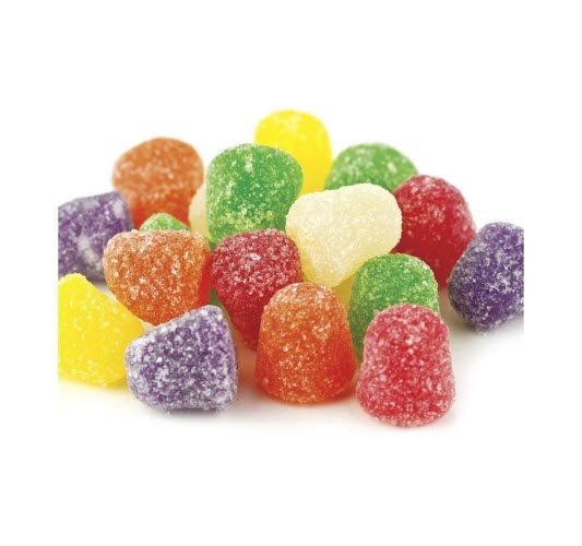 A variety of colorful spiced gumdrops with a sugar coating, displayed in an assortment of colors including purple, red, orange, yellow, and green.