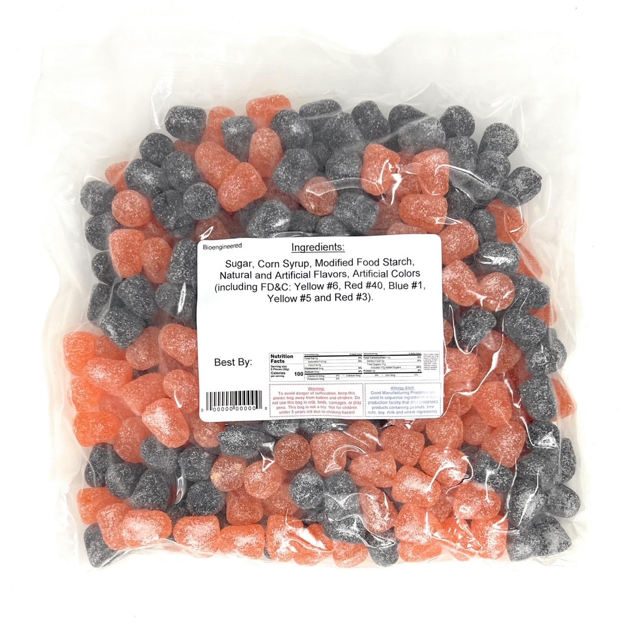 Bag of orange and black licorice spice drops with a nutrition label on a white background