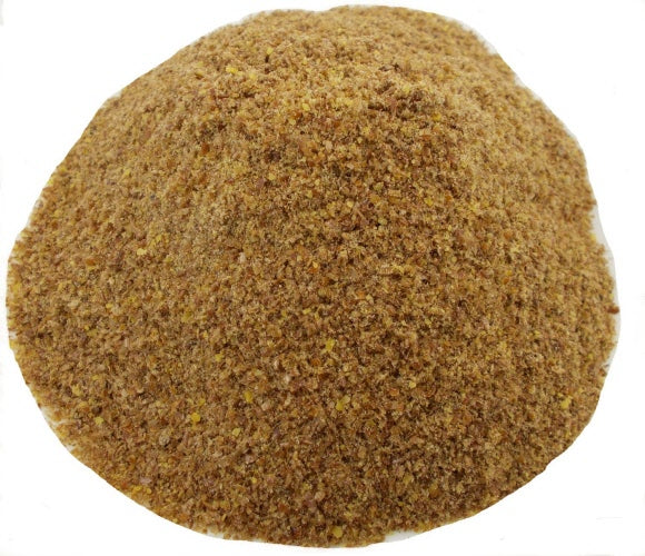 A pile of ground flax seed meal with a nutty color