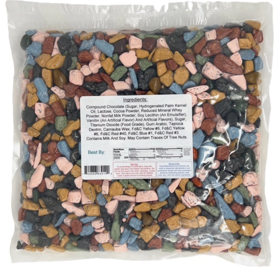 Bag of multicolored chocolate covered rocks cand with a nutrition label on a white background