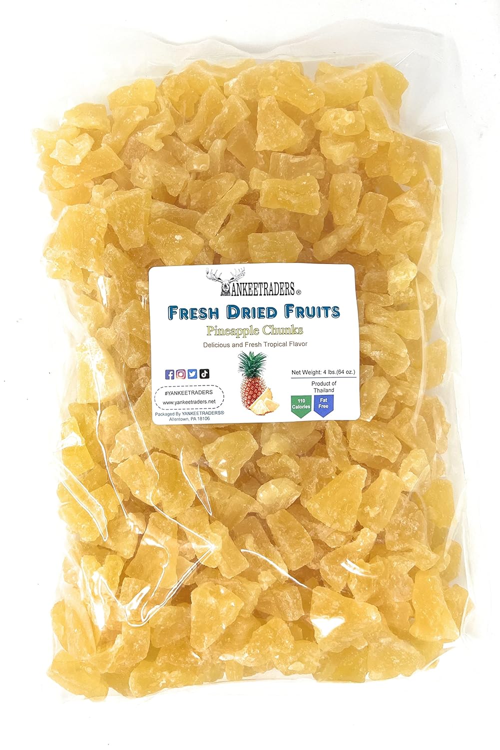 Bag of fresh dried pineapple chunks with a label on a white background