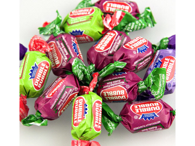 A group of individually wrapped Dubble Bubble bubble gums in 3 flavors, with colors predominantly red, green, and purple.