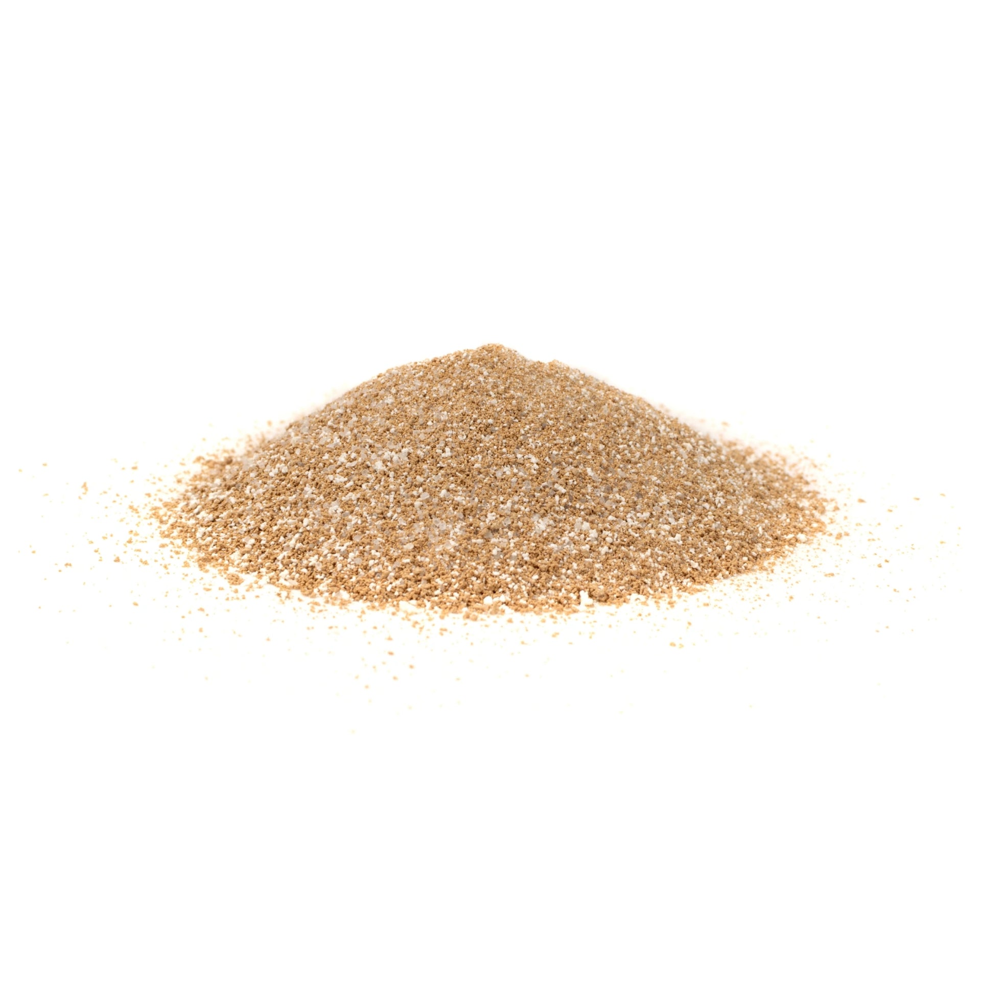 Pile of dry instant cappuccino beverage mix on a white background