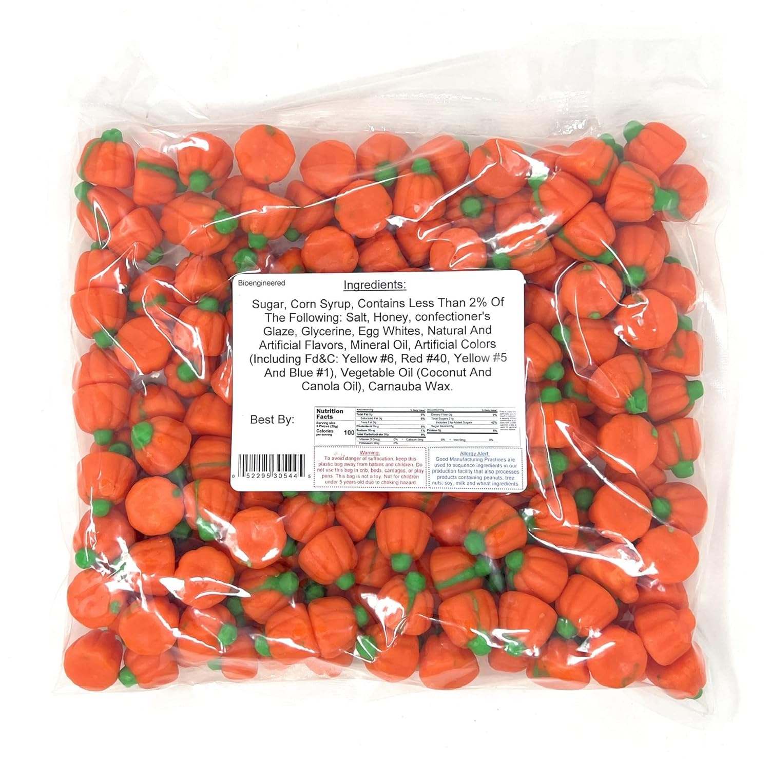 Bag of orange candy Mello pumpkins with a nutrition label on a white background