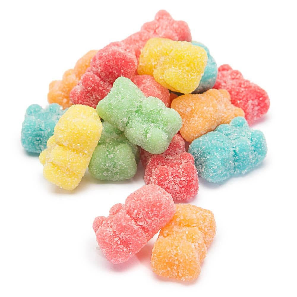 Colorful neon gummy bears on a white background