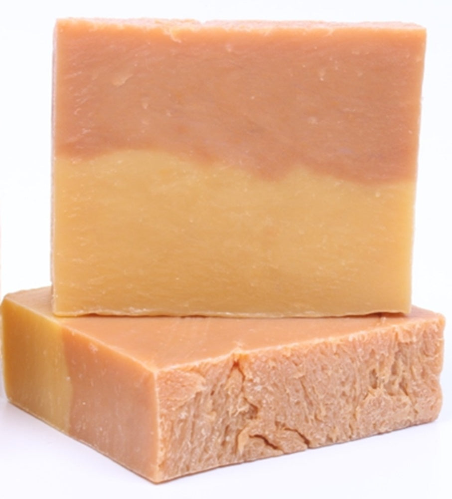 Two layered Patchouli organic soap bar on a white background