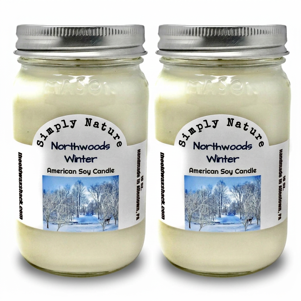 Two Northwoods Winter candles on white background